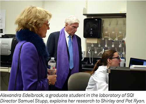 Graduate student Alexandra Edelbrock explains her research to Shirley and Pat Ryan.